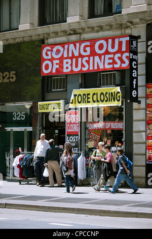A men's clothing store store on Broadway in Lower Manhattan in New York announces that it is soon going out of business Stock Photo