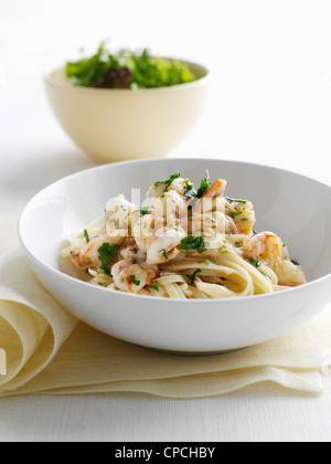 Plate of prawns in pasta Stock Photo