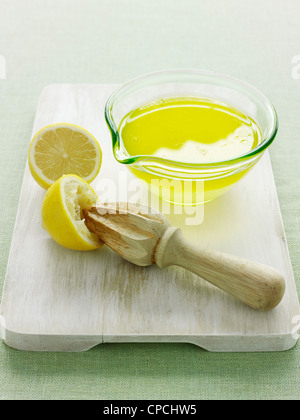 Bowl of fresh squeezed lemon juice Stock Photo