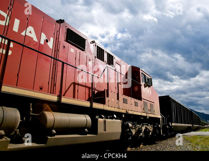 A Canadian Pacific AC44 travelling through Banff Station, Alberta, Canada Stock Photo