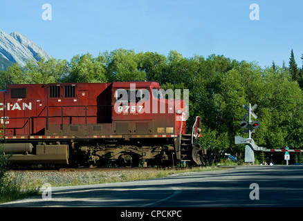 A Canadian Pacific AC44 travelling through Banff Station, Alberta, Canada Stock Photo