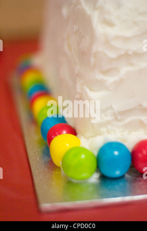 Colourful Gumballs on Child's Birthday Cake Stock Photo