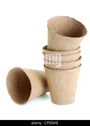 Empty peat pots shot over white background Stock Photo