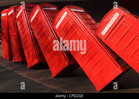 British red K2 telephone boxes, David Mach's Out of Order sculpture, at Kingston-upon-Thames, a suburb of London, England, UK Stock Photo
