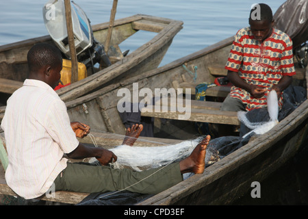 Fishermen in Ganvie lake village on Nokoue Lake, Benin, West Africa, Africa Stock Photo