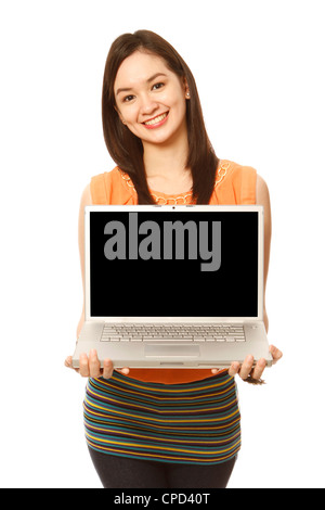 Young woman holding a laptop computer (on white background) Stock Photo