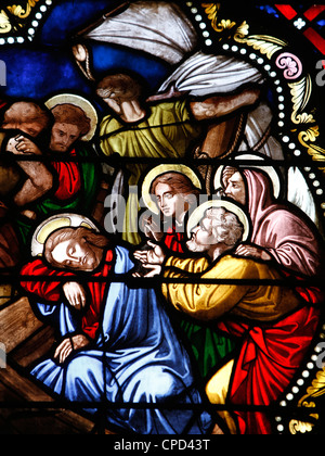 Stained glass of Jesus asleep in the boat during a storm, St. Vincent's cathedral, Burgundy, France Stock Photo