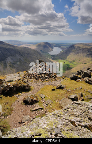 View from the summit of Great Gable over the Westmorland Cairn towards Wasdale and Wastwater in the English Lake District Stock Photo