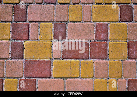 Background - color bricks of a roadway close up Stock Photo