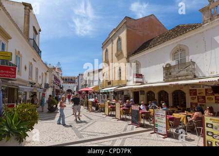 Shops and restaurants on Rua 5 de Outubro in the old town centre, Albufeira, Algarve, Portugal Stock Photo