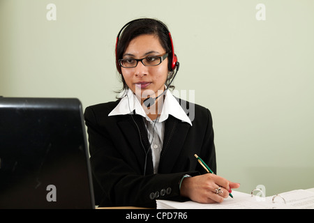 A student studying using a computer. Stock Photo