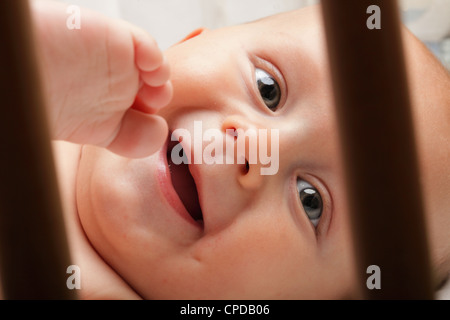 baby boy in diaper on white, blue eye Stock Photo