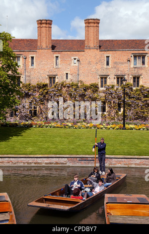 People punting on the river Cam by Magdalene College, Cambridge UK Stock Photo