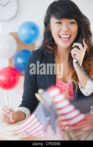 Young brunette woman at political election sitting by ballot shocked