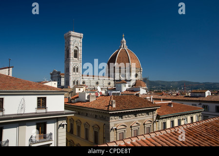 A view over teracotta rooftops to the Duomo and Campanile, Florence, UNESCO World Heritage Site, Tuscany, Italy, Europe