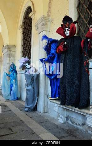 Masked figures in costume at the 2012 Carnival, Venice, Veneto, Italy, Europe Stock Photo