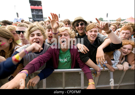 Crowd in front row screaming at a music concert Stock Photo