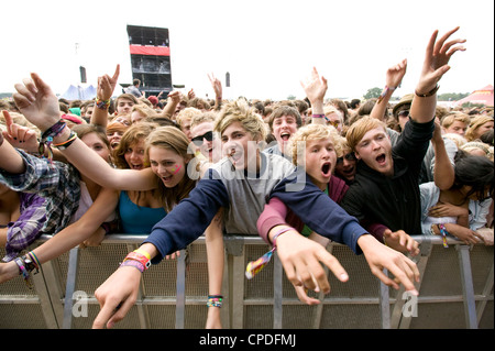 Crowd in front row screaming at a music concert Stock Photo