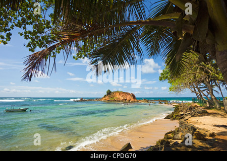 The eastern point of this beautiful south coast whale watching surf beach at Mirissa, Matara, Southern Province, Sri Lanka, Asia Stock Photo