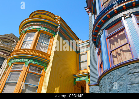 Colourfully painted Victorian houses in the Haight-Ashbury district of San Francisco, California, USA Stock Photo