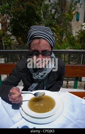 Tourist having fish soup Konoba Leut restaurant Veli Varos district Split Dalmatian coast Croatia Europe Stock Photo