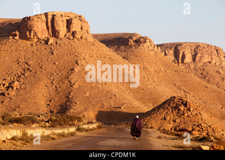 Man walking on the Chenini village road, Tunisia, North Africa, Africa Stock Photo