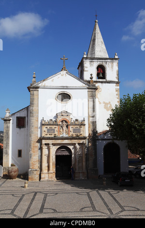 The medieval St. Mary Church (Igreja de Santa Maria) in centre of the walled city of Obidos, Estremadura, Portugal, Europe Stock Photo