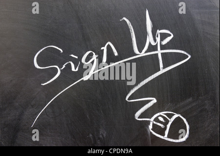 Sign up word and mouse sign drawn on chalkboard Stock Photo