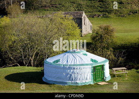 Round Camping rental accommodation, Park House Farm Yurt, alone, one,  mongolia, nomadic tent, nature, house in the landscape of  Yorkshire Dales, UK Stock Photo