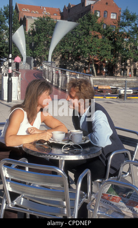 happy couple having coffee on terrace (Bristol) Stock Photo