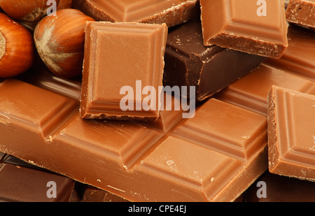 A real Milk chocolate bar with milk and dark chocolate chunks on the top Stock Photo