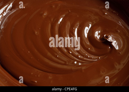 Authentic melted chocolate background Stock Photo