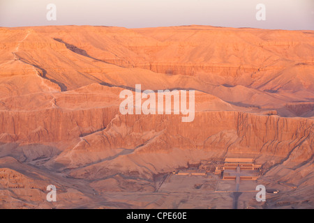 Aerial view from hot air balloon of Hatshepsut's Mortuary Temple at sunrise, Deir el-Bahri, Thebes, Egypt, Africa Stock Photo