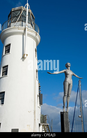 Figure of the Diving Belle sculpture next to Scarborough Lighthouse North Yorkshire coast coastal resort England UK United Kingdom GB Great Britain Stock Photo
