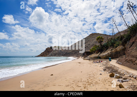 Beach in the small fishing village of Burgau on the coast between Sagres and Lagos, Algarve, Portugal Stock Photo