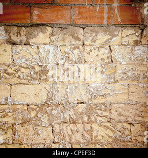 brick wall grunge scraped brickwall to restore the mortar plaste Stock Photo