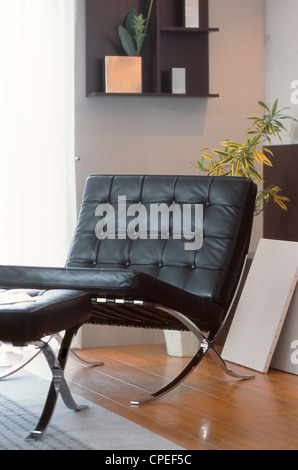 Leather Easy Chair With Side Table Stock Photo