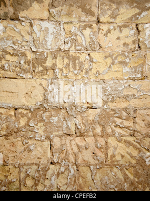 brick wall grunge scraped brickwall to restore the mortar plaste Stock Photo