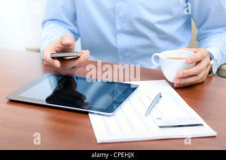 Businessman using new technologies for success workflow. Stock Photo