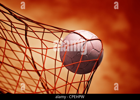 symbolic picture for goal with a soccer ball in net Stock Photo