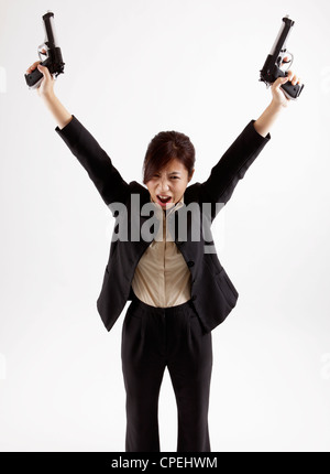 Portrait of office lady playing gun Stock Photo - Alamy