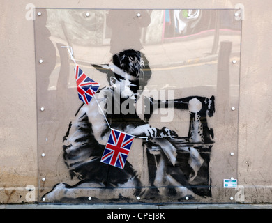 Security brought in to protect latest Banksy in Turnpike Lane, London - EDITORIAL USE ONLY/NO COMMERCIAL USE, ADVERTISING ETC Stock Photo