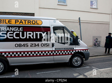 Security brought in to protect latest Banksy in Turnpike Lane, London - EDITORIAL USE ONLY/NO COMMERCIAL USE, ADVERTISING ETC Stock Photo