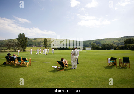 General view of a cricket match in Southern England. Picture by James Boardman. Stock Photo