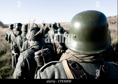 Second world war soldiers standind in a row Stock Photo