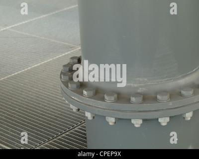 Construction metal tube with screws on a decking floor Stock Photo