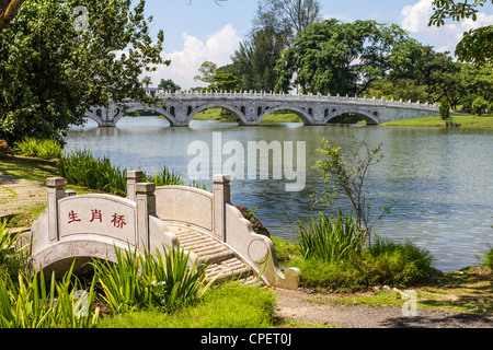 Bridges over lake in Chinese and Japanese Gardens, Singapore Stock Photo