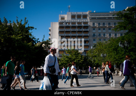 people walking in Syntagma Sq, Athens, Greece Stock Photo