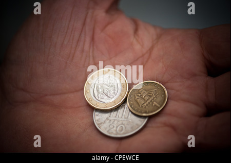 One euro coin together with 20 drachma coin and a one drachma coin Stock Photo