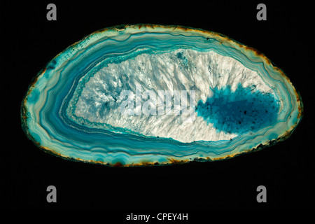 Thin section of blue agate isolated on black background Stock Photo